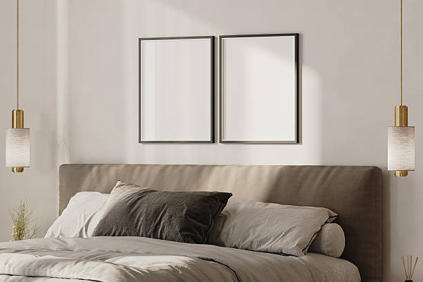 two blank picture frames mock-up above bed in modern bedroom interior, 3d render